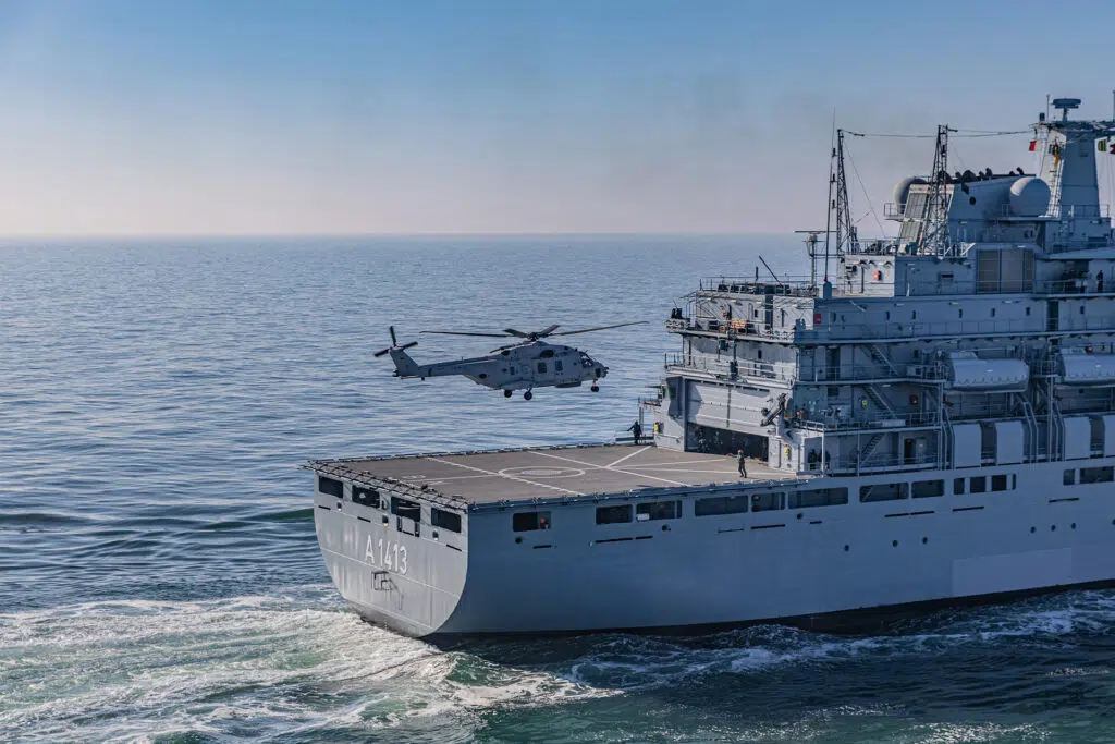 NH90 is landing on the combat support ship
